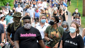 Neighbors fight fear by walking together