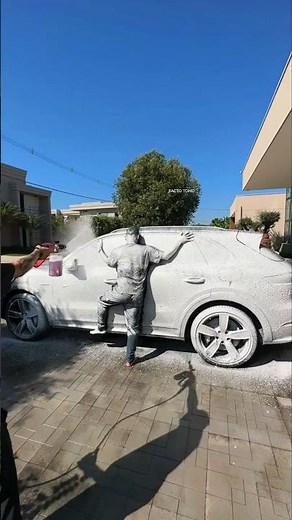 This Man Sticks to His Car While Washing It #shortvideo