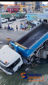 The scene earlier today where two sand trucks collided on Sheriff Street. | Credible Sources