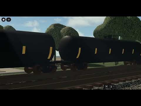 NS 8078 ES44AC leads NS 18M a mixed freight train passing through in Columbus, Ohio