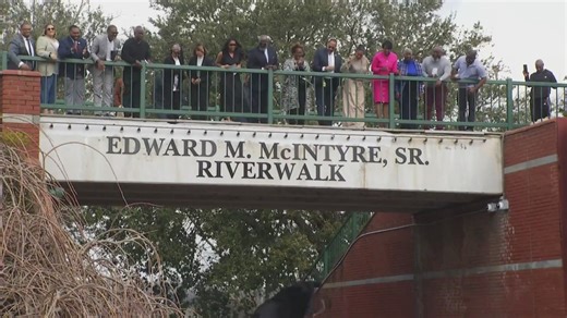 New Riverwalk sign honoring Ed McIntyre unveiled