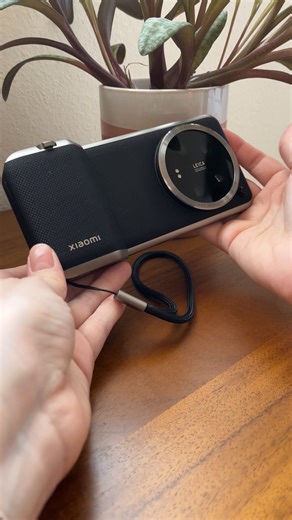 One of my favorite phone accessories of 2023 just got an update. The Xiaomi 14 Ultra, which has an amazing camera by itself, gets even better with this photography kit. The kit comes with a case that features a grip with a shutter button, a zoom lever, and a handy customizable dial. #xiaomi #mobile #leica #cameratech #phoneaccessories | The Verge