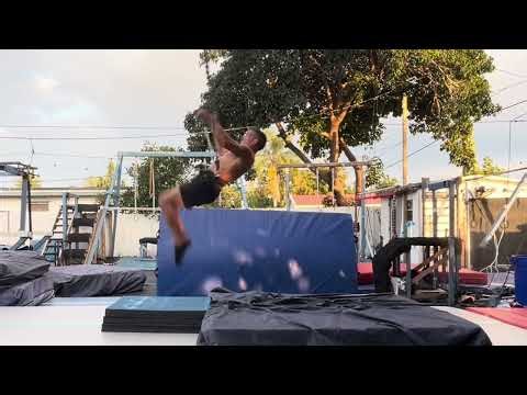 Back Tuck Slow Motion: Kicking Out Before Rotation Finishes