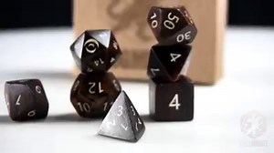 Did you see the incredible Dog Might Games #DnD dice boxes and DM screen from Lost Odyssey: Toy Time For Ten-Towns? Follow Lost Odyssey Events & visit the lostodysseyevents.com for your chance to get one of the #StrangerThingsDnD #dice sets and box props from the show! | Dungeons & Dragons