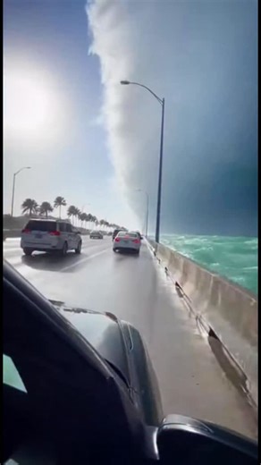 Shawn Arranha on Instagram: "😱THE MALDIVES SCARY WAVE😱 Imagine driving across a bridge in the Maldives, the sun is shining, and the turquoise water is calm. Then, you look to your right. The horizon didn’t just disappear—it rose. A wall of water, silent and towering like a skyscraper, looming over the road. No sirens. No warning. Just the sound of your own heartbeat before the world turns blue and cold. This isn’t a dream; it’s the moment nature decides to take it all back. Would you stay in t