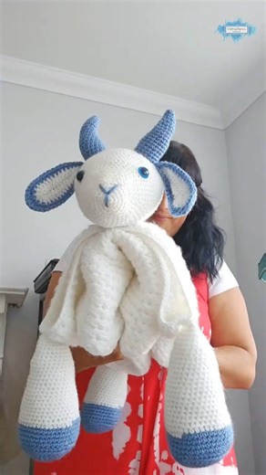 This crochet goat afghan is perfect for tummy time or a quick nap! Download the pattern from my shop! 🧵 #crochetblanket #crochettoy #craftinghappiness | Crafting Happiness