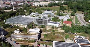 Phipps Conservatory and Botanical Gardens in Pittsburgh, Pennsylvania, United States. Schenley Park's horticulture hub features botanical gardens and a steel glass Victorian greenhouse