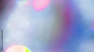 Bright Diffraction in a Thick Prism. Loop. The light passes through the facets of a slowly rotating diamond and creates repetitive sparkling highlights and rainbow colors