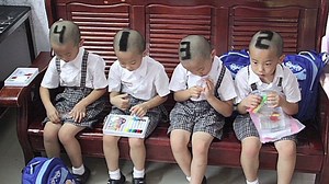 Odd way to tell quadruplets apart