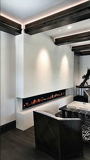 Hand-Carved Natural Stone Fireplaces With Custom Over-Mantels