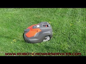 Husqvarna 550H EPOS Automower Striping A Lawn With Systematic Mowing