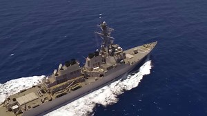 Chinese pilot performs aggressive maneuver near warship