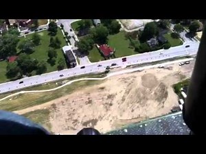 Windsor's riverfront from open door of military helicopter