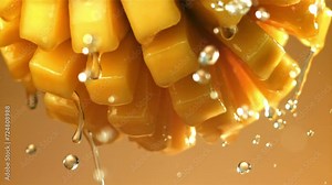 Drops of water drip from fresh mango. Filmed on a high-speed camera at 1000 fps. High quality FullHD footage