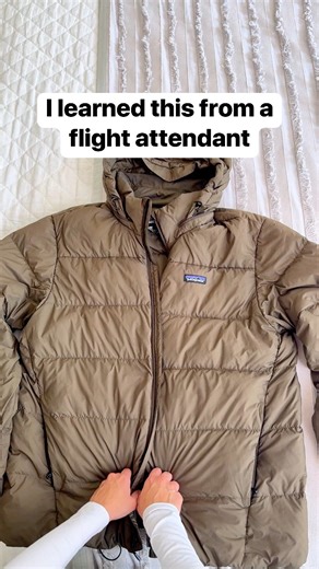 Space saving packing tip for bulky clothing #flightattendant #packingtips #suitcase #coats | Liz & Jeff