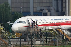 Co-Pilot Partially Sucked Out of Plane in Sudden Depressurization Episode