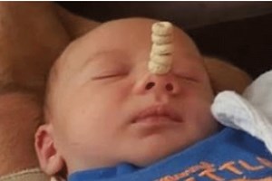 Dads compete in Cheerios stack challenge -using their babies - Netmums