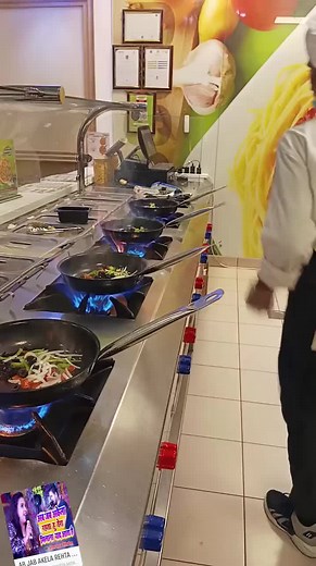 Cooking Techniques with Woks in a Professional Kitchen