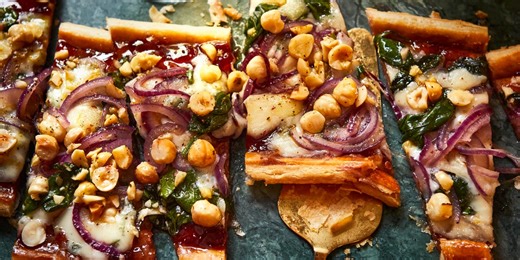 Buttery puff pastry is topped with sticky cranberry sauce and creamy cheese in this canapé recipe