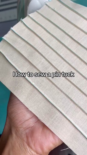 How to sew a Pintuck! This is a super easy sewing design to add to any garment to bump it up a notch! #JOANN #craftingmaterials #diy #howtosew #sewingtutorial #sewingtipsandtricks #sewingforbeginners