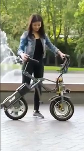 This ELECTRIC TRIKE FOLDS & LEANS Into Turns!