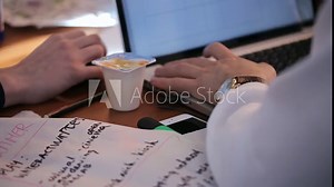 Male hands using laptop keyboard and computer mouse