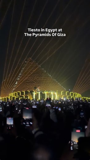 Cairo Spots on Instagram: "Tiësto at the Pyramids of Giza delivered exactly what was promised: one of the strongest trance sets heard here in years. Arrival and entry through the Grand Egyptian Museum were smooth despite the scale of the crowd, with shuttle movement staying organized from start to finish. Once inside, the setup felt closer to a multi zone festival than a single stage show, with food spots, brand activations, and side areas spread across the plateau. After opening sets by Ashmawy