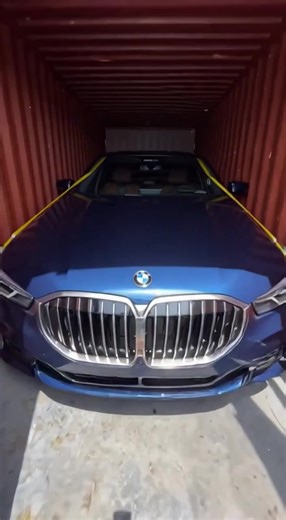 Royal Blue BMW at the Lighthouse: A Stunning View