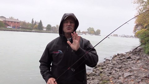 Shore fishing in the rain for salmon using roe bags