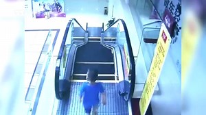 942K views · 21K shares | Boy survives after falling from escalator in China A two-year-old boy survived after falling from the top of an escalator to the floor below at a shopping mall in Dongguan, Guangdong Province on Tuesday. Surveillance video shows him climbing the escalator handrail before it pulls him over the edge. Fortunately the toddler is now recovering, after several days of life-saving efforts. | CGTN | Facebook