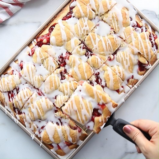 With a hint of almond extract, a heavenly glaze, and cherry pie filling swirled throughout, these delicious Cherry Bars are the sweetest way to easily treat a crowd! FULL RECIPE: https://lilluna.com/cherry-bars/ | Lil' Luna - Kristyn Merkley