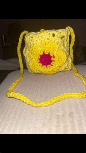 Girls’/toddler/ women’s small purse number 2/6 is done 👏🏻 ahhhh! I LOVE this red heart super saver Flower power yarn… I’m calling this bag the Buttercup Flower Child bag! What do ya’ll think? #fyp #hobbiesinyour20s #crochetersoftiktok #smallbusinessownersoftiktok #redheartyarn