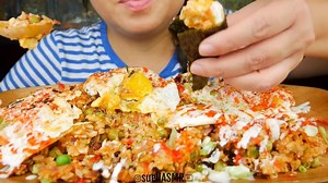 Suella on Instagram: "Fried rice with tuna & eggs as protein. Yup, wrapping fried rice in seaweed IS better!! ... not that you asked 😆 Link in my bio #youtube #suellasmr #asmr #foodie #mukbang #eatingshow #asmrcommunity #instafood #eatingsounds #food #soothing#calming #foodporn #yummy #satisfying #delicious #suellies#friedrice #tunaistheshit"