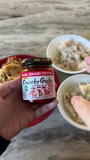 Crunchy garlic meets fiery chili oil—a flavor explosion that makes every bite irresistible! S and B's Umami Topping brings authentic Japanese quality with its fermented garlic and chili combo. The crunchy texture and subtle heat awaken your taste buds, perfect for noodles, fried foods, or as a marinade. Allergy-friendly formula contains soy and almond, ready to elevate any dish in seconds. Click to upgrade your kitchen essentials—satisfy your cravings today! @Weee Asian Supermarket #ChiliCrisp #
