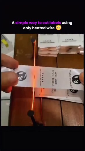 science and technology on Instagram: "At first glance, it looks almost too simple — but this method is pure efficiency 🔥✂️ This is a simple way to cut labels using only a heated wire, and it works because of one basic principle: heat reduces resistance. When a thin metal wire is heated electrically, it becomes hot enough to melt or cleanly separate synthetic label material the moment it makes contact. Instead of tearing, crushing, or leaving rough edges, the label parts smoothly, as if it were 