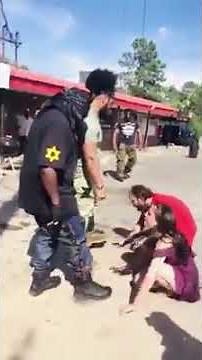 Pathetic guy and girl kissing the shoes of each person that walks by.