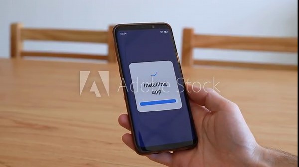 Intalling new app on your smartphone. Process of downloading new applications from the store. vídeo de Stock