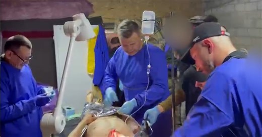 'Save His Leg': Ukrainian Medics Scramble To Save Lives