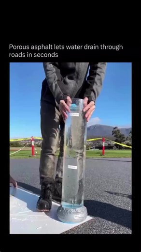 Artificial Intelligence | ChatGPT I Technology on Instagram: "Watching porous asphalt in action feels surreal because the moment water hits the surface it slips straight through, leaving the road almost instantly clear like the storm never touched it. Its design relies on open pathways within the pavement and a thick stone layer below that catches the water and slowly releases it into the ground. Communities using it often notice safer driving during storms because the surface stays dry and stea