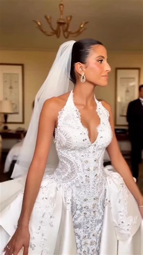 A vision of timeless bridal elegance — this inspo gown features a hand-beaded lace silhouette with a structured halter neckline and a detachable satin overskirt, designed to accentuate every curve with refined sophistication. Perfect for brides seeking both glamour and versatility, it transitions effortlessly from ceremony to reception. Discover more statement gowns at The Victorian Bridal, home of luxury craftsmanship and couture design. . Credit: DM . #TheVictorianBridal #MadelinaBride #Luxury