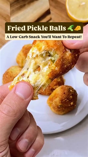 Fried Pickle Balls 🥒🧀 A low-carb take on fried pickles—crispy on the outside, cheesy on the inside, and ready in under ten minutes. 😋 🚨 Full recipe with tips, variations, and nutrition info: ➡️ https://keto.recipes/crispy-fried-pickle-balls-easy-cheesy-air-fryer-snack/ 💬 Would you try these? Drop a 🥒 below! Don't forget to SAVE and SHARE this easy #snack #recipe! 📸: @ketosnackz | Keto Recipes