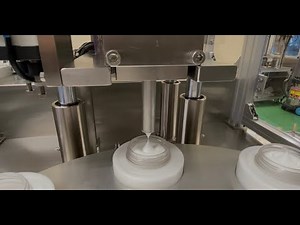 クリーム・化粧水充填機