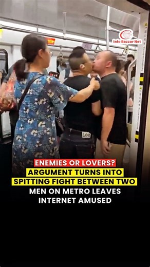 Info Bazzar Net on Instagram: "A bizarre altercation on a metro train in China has gone viral on social media, leaving viewers shocked and amused in equal measure. The video shows two men travelling on a crowded metro getting into a heated argument that quickly takes an unexpected turn. Instead of shouting or pushing, the men begin spitting on each other’s faces repeatedly, standing so close that their confrontation awkwardly resembles a kiss rather than a fight. In the clip, a woman believed to