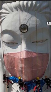 805K views · 6.9K reactions | A massive custom-made "face mask", weighing 77lbs, was placed on a giant Buddhist goddess statue in Japan to pray for the end of the coronavirus pandemic. | ABC News | Facebook