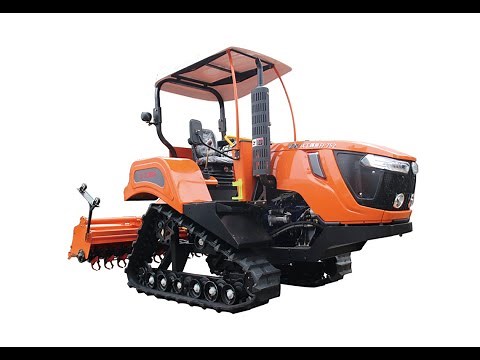 75HP agricultural crawler tractor working with ridger plough in dry farm and paddy field.