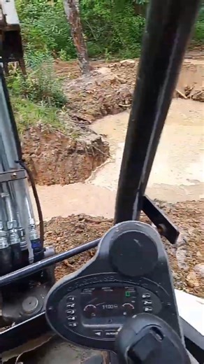 Bobcat e26 building a pond