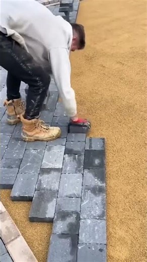 Installation of black bricks in yard to prevent muddy surface #shorts