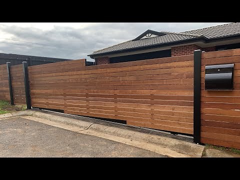 Horizontal Merbau front feature fence with automatic sliding gate