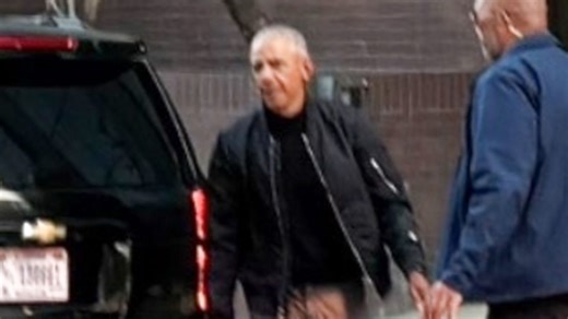 Barack Obama looks glum as he and daughters seen out without Michelle again