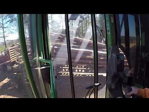 Loading International & Peterbilt log trucks